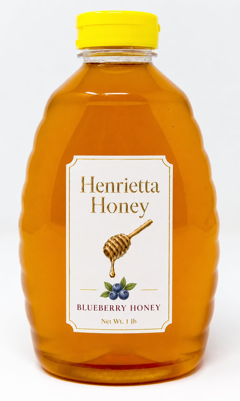 A 1 lb bottle of Henrietta Honey blueberry infused honey with a gold foil label