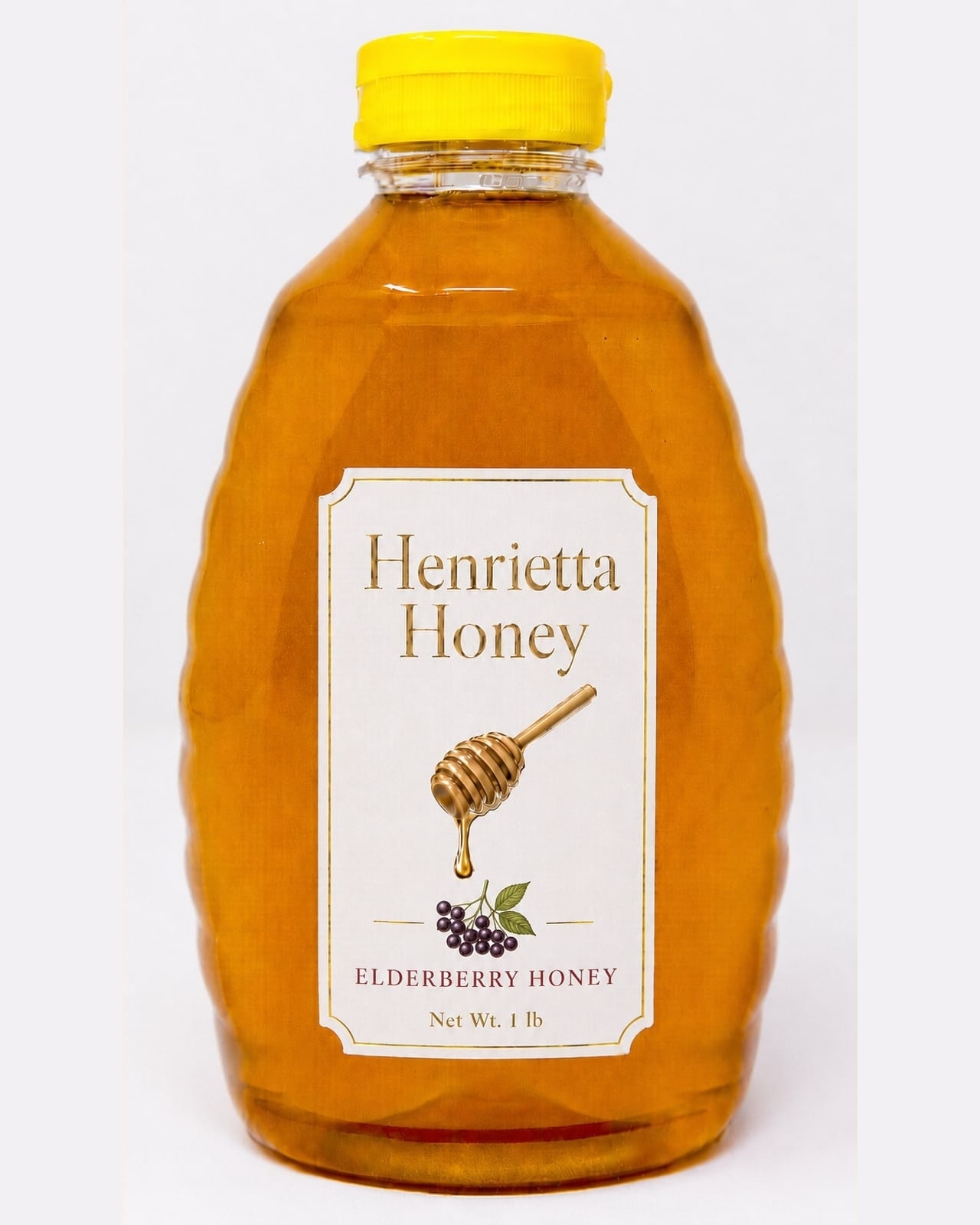 A 1 lb bottle of Henrietta Honey elderberry infused honey with a gold foil label