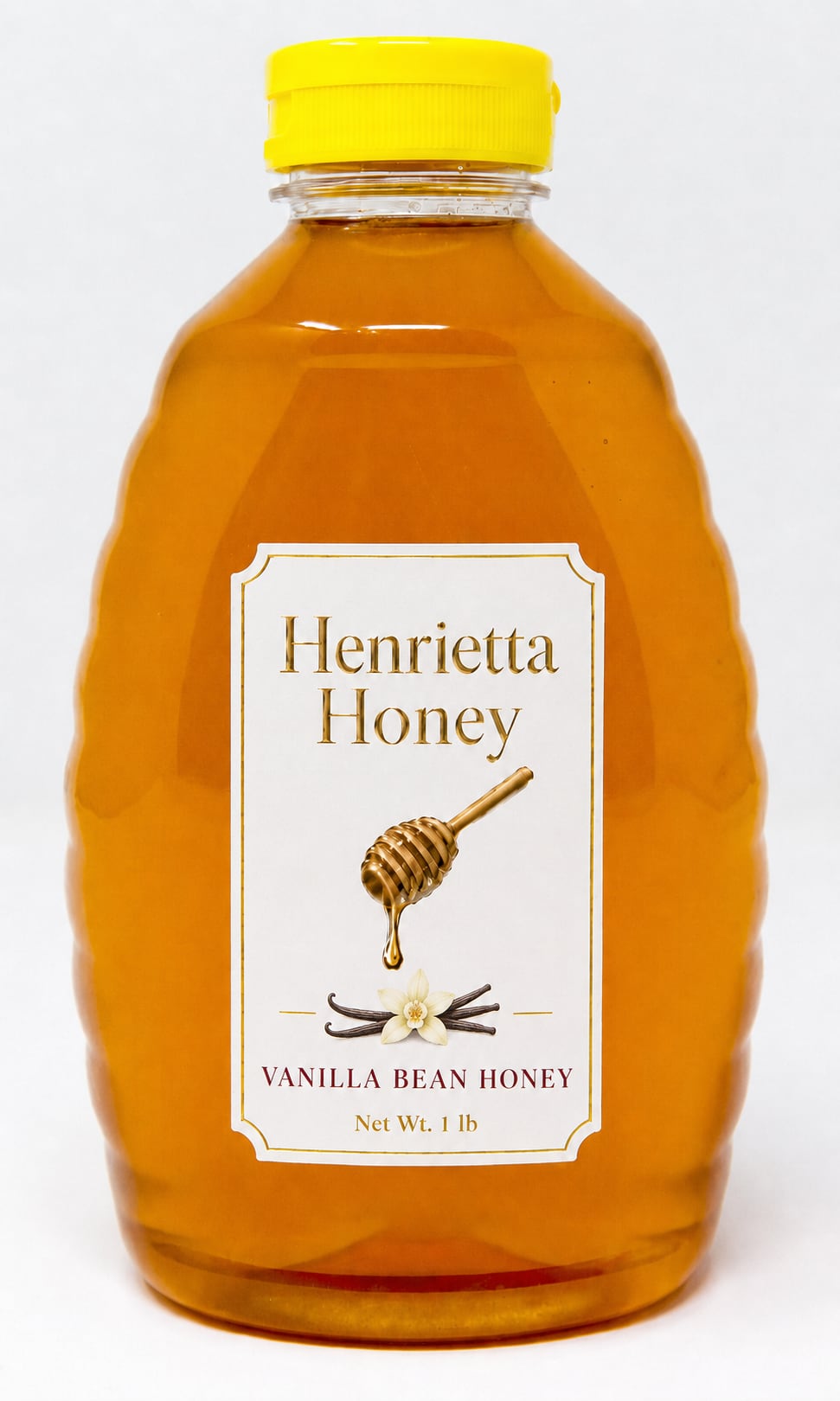 A 1 lb bottle of Henrietta Honey vanilla bean infused honey with a gold foil label